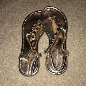 Gold sandals with gem detail